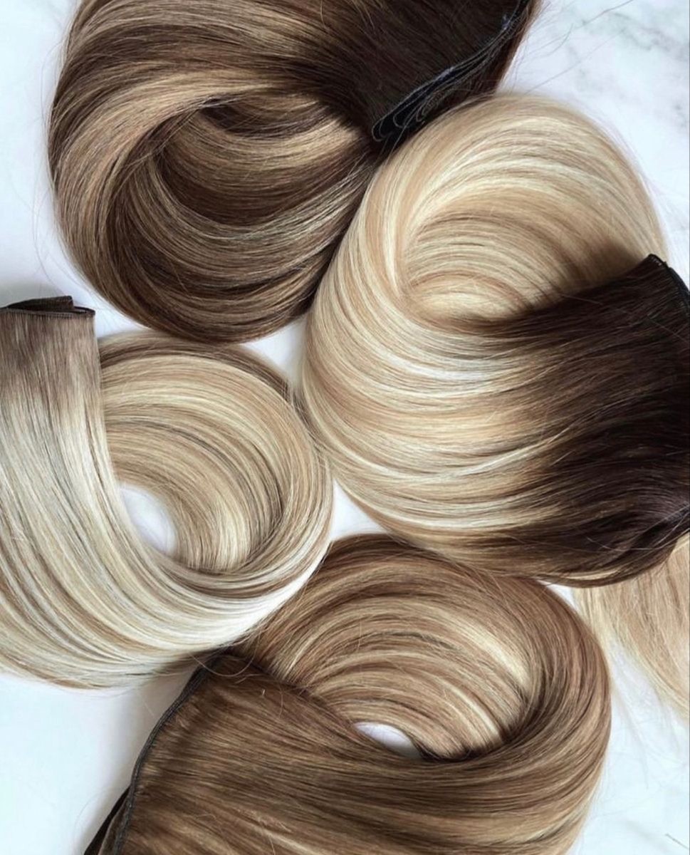 100% human hair extensions 50grams each, can last up to 1 year with proper care!