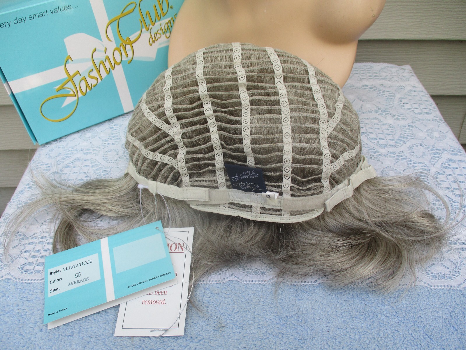 The Wig Company Wig FLIRTATIOUS Color 56 GRAY Classic Mid Length Style