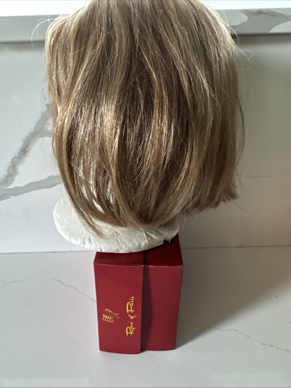 Rene of Paris Synthetic Wig Short Bob with Bangs Blonde Highlighted