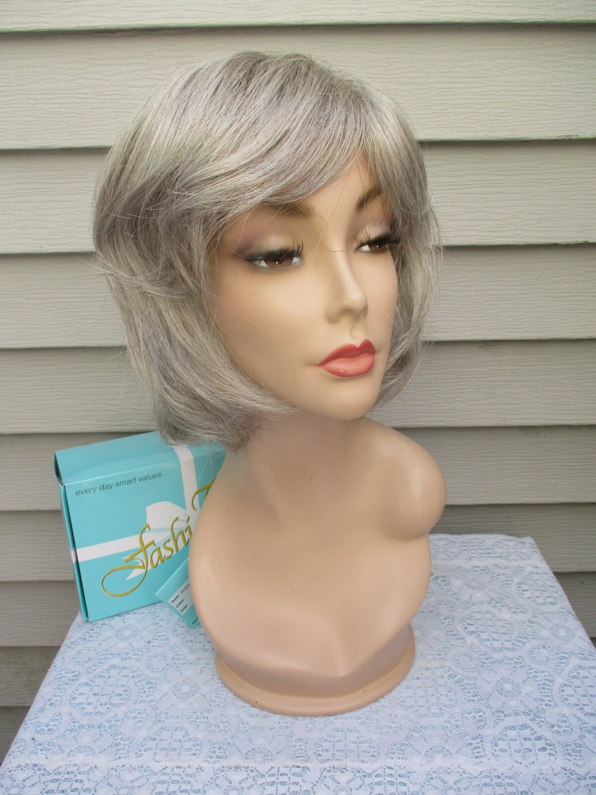 The Wig Company Wig FLIRTATIOUS Color 56 GRAY Classic Mid Length Style