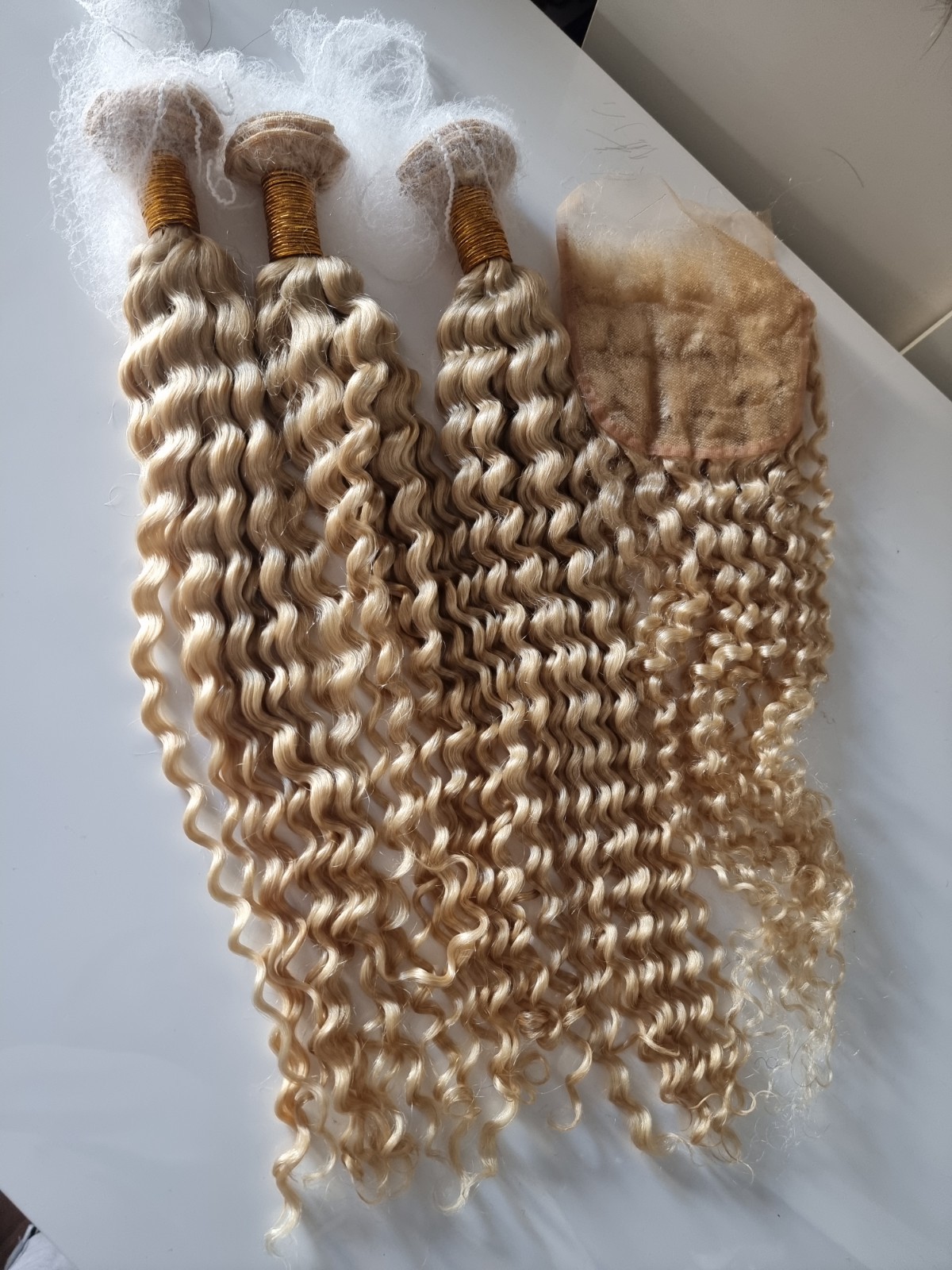 12A PERUVIAN HUMAN HAIR SUNNY BLONDE 24# 26+26+26&22INCH 5X5 CLOSURE DEEP CURLS