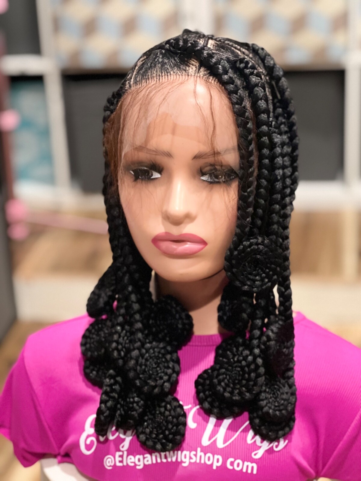 Knotless braided wig, made on a full lace wig. Length Is 16”long.