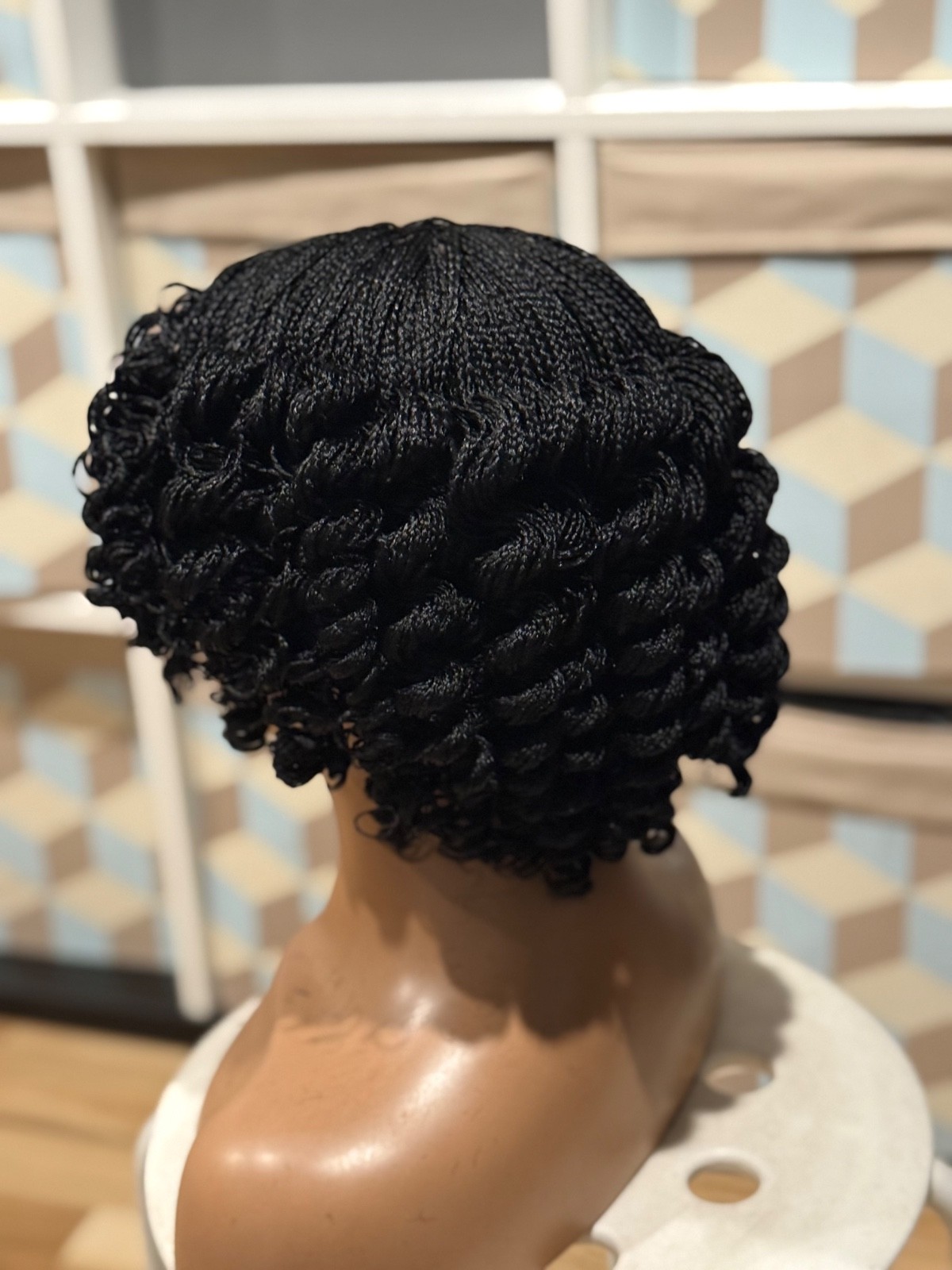 Micro twist braided wig. It is made on a closure