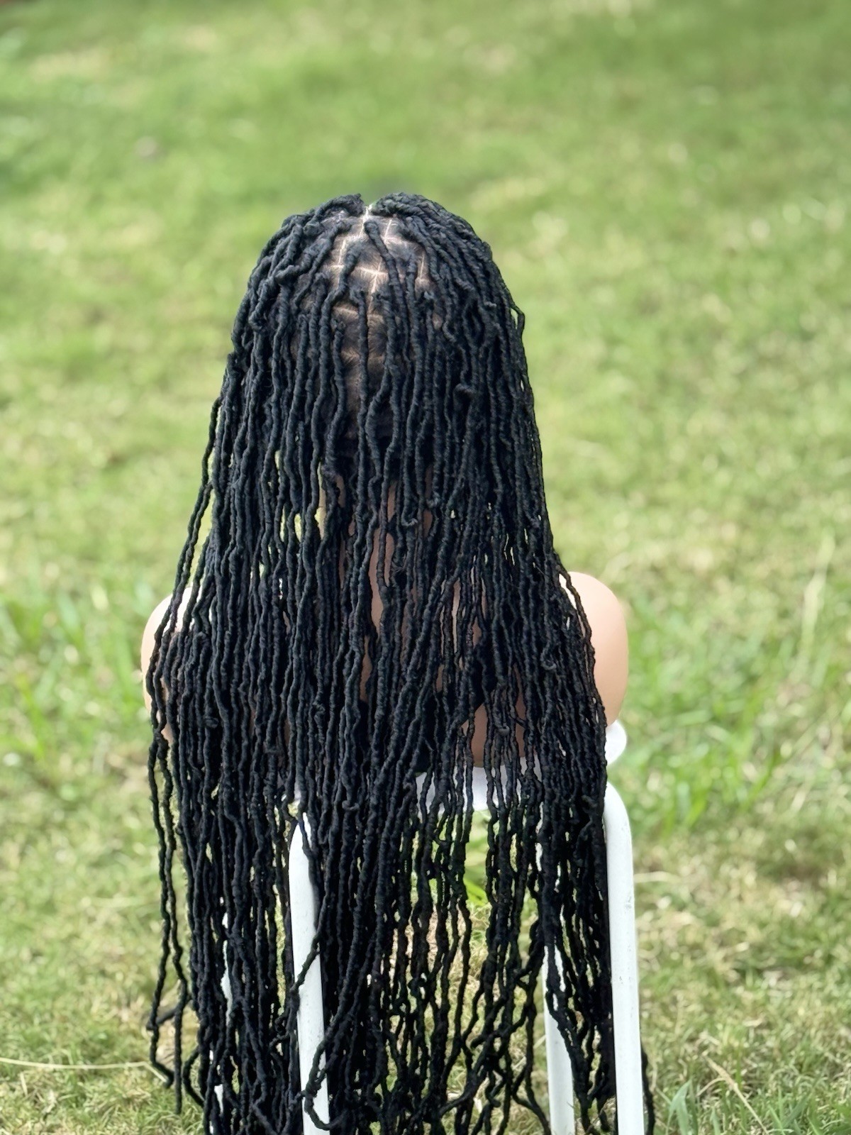 braided handmade faux locs. Color is black. Length Is 26inches. Full Lace Wig