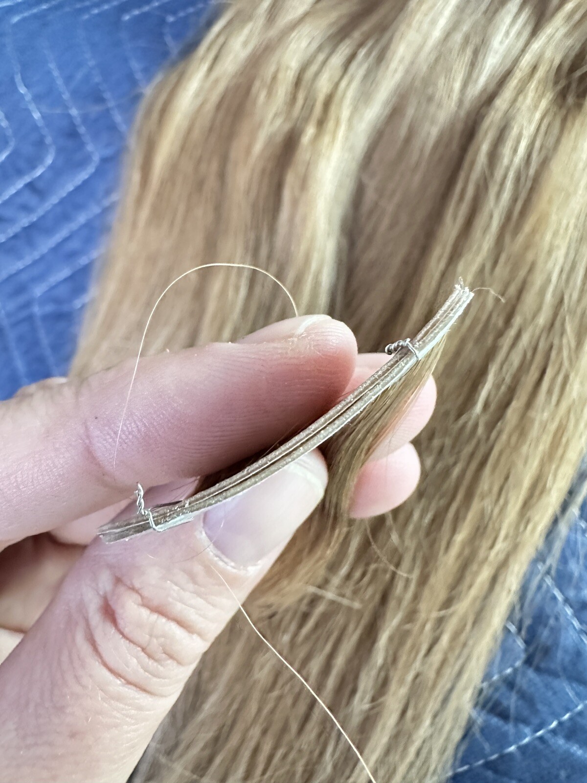 Tape hair extensions with a slight wave