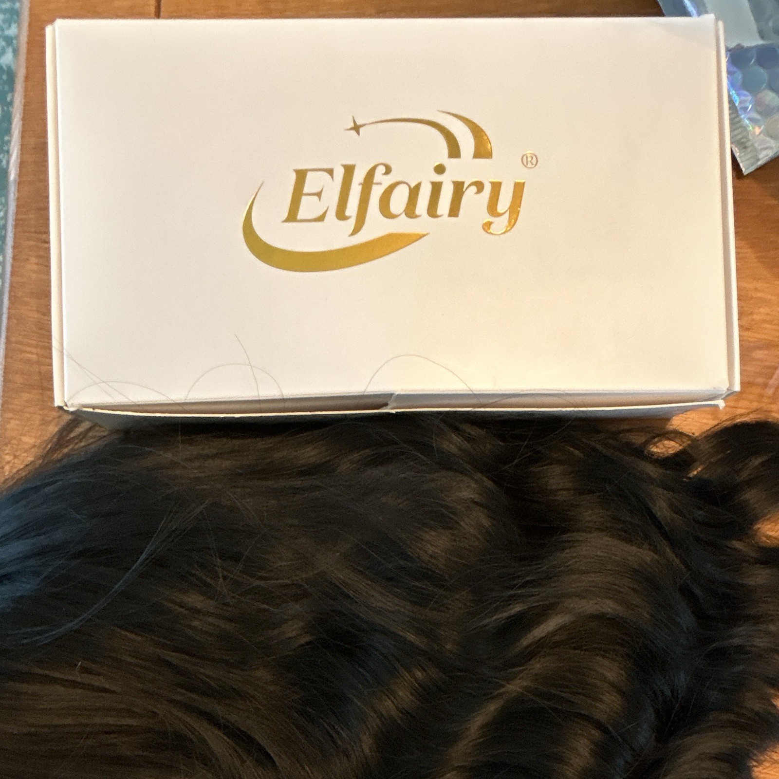 Elfairy 2 Black Wavy Clip-In Wig with Bangs, Classic Cap, Adjustable Strap
