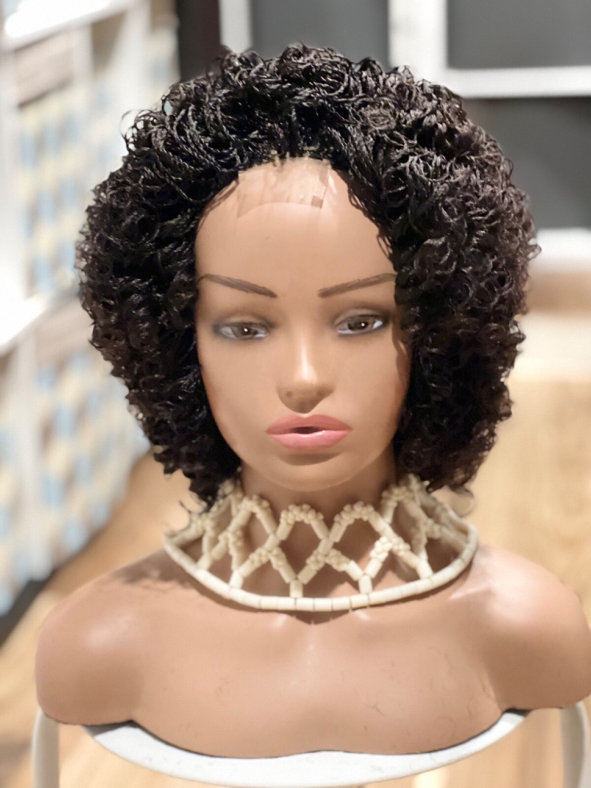 Braided micro twist afro curly wig. just as pictured. color is Brown mix