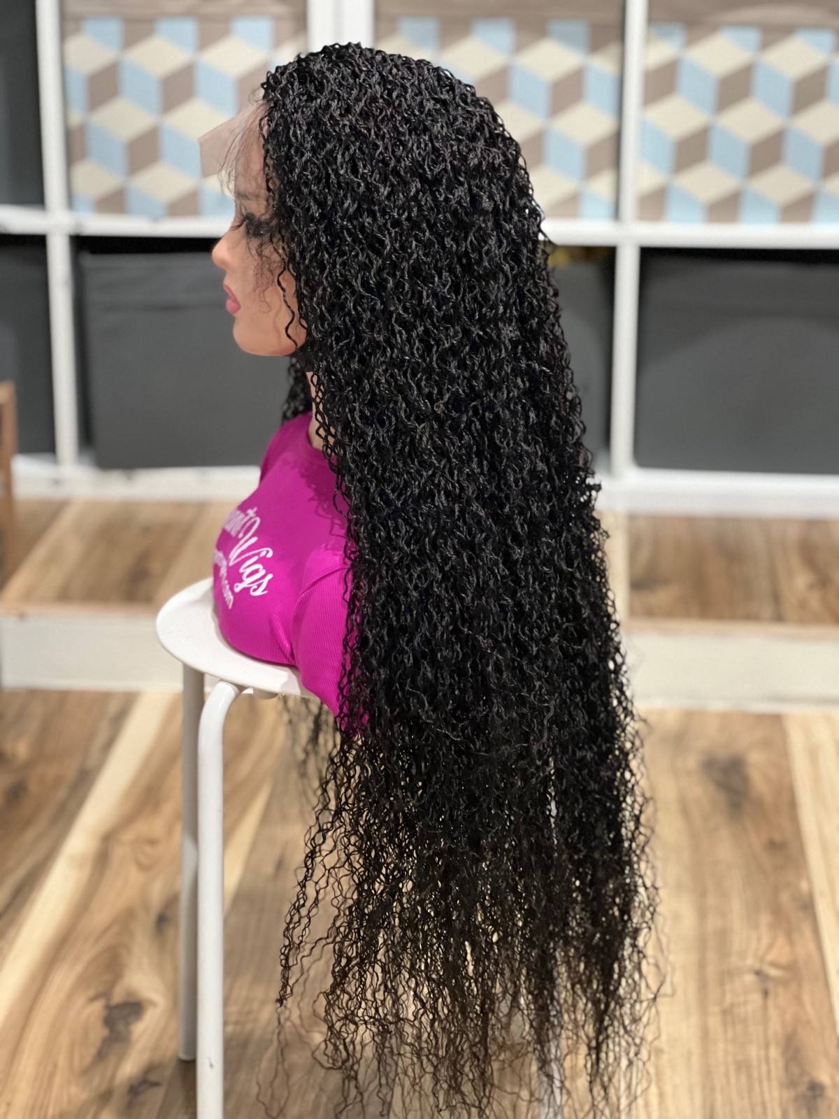 Braided water wave wig made on a full lace wig.length is 30”long. Black.
