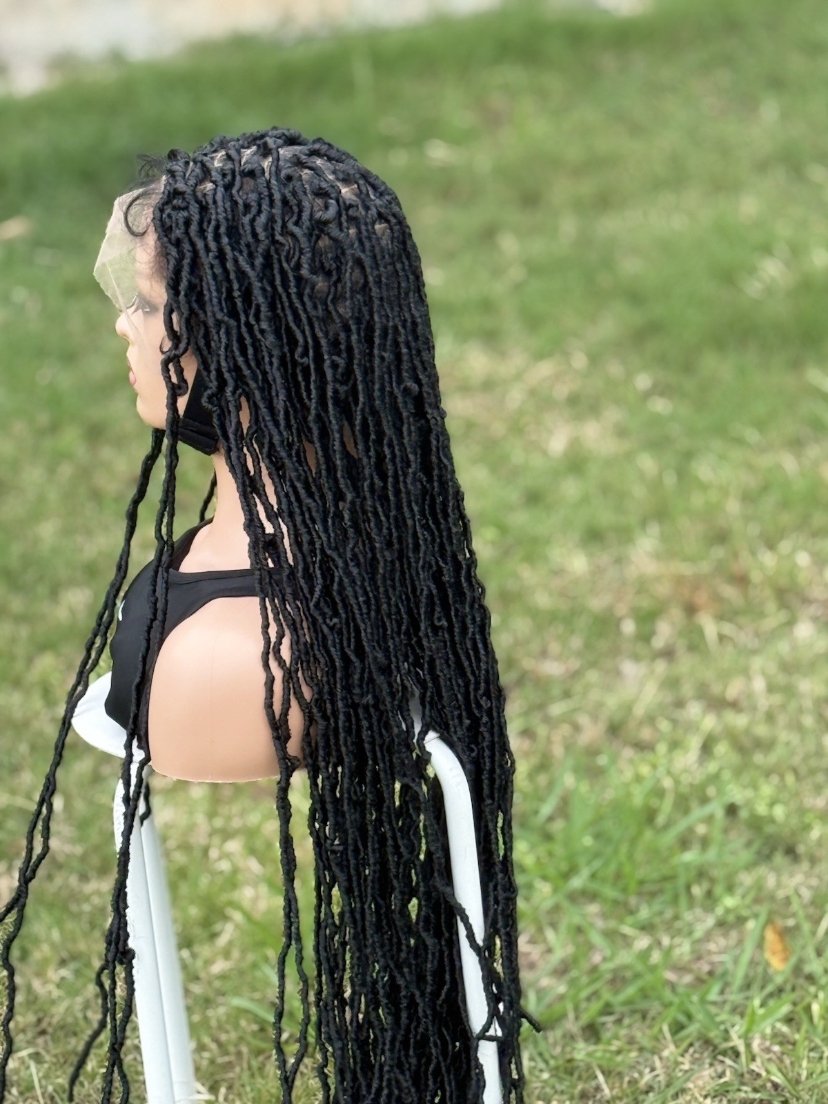 braided handmade faux locs. Color is black. Length Is 26inches. Full Lace Wig