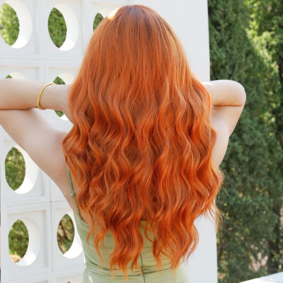 Orange wavy long curly hair with fringe hairstyle yellowish hairdo headband