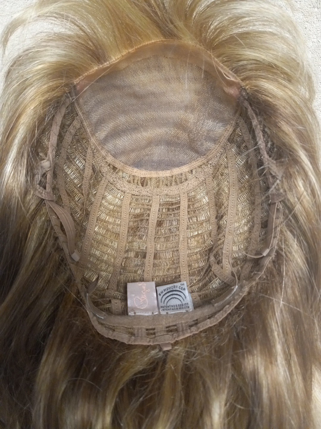Raquel Welch Synthetic Wig. Color: Light Brown With Light Highlights
