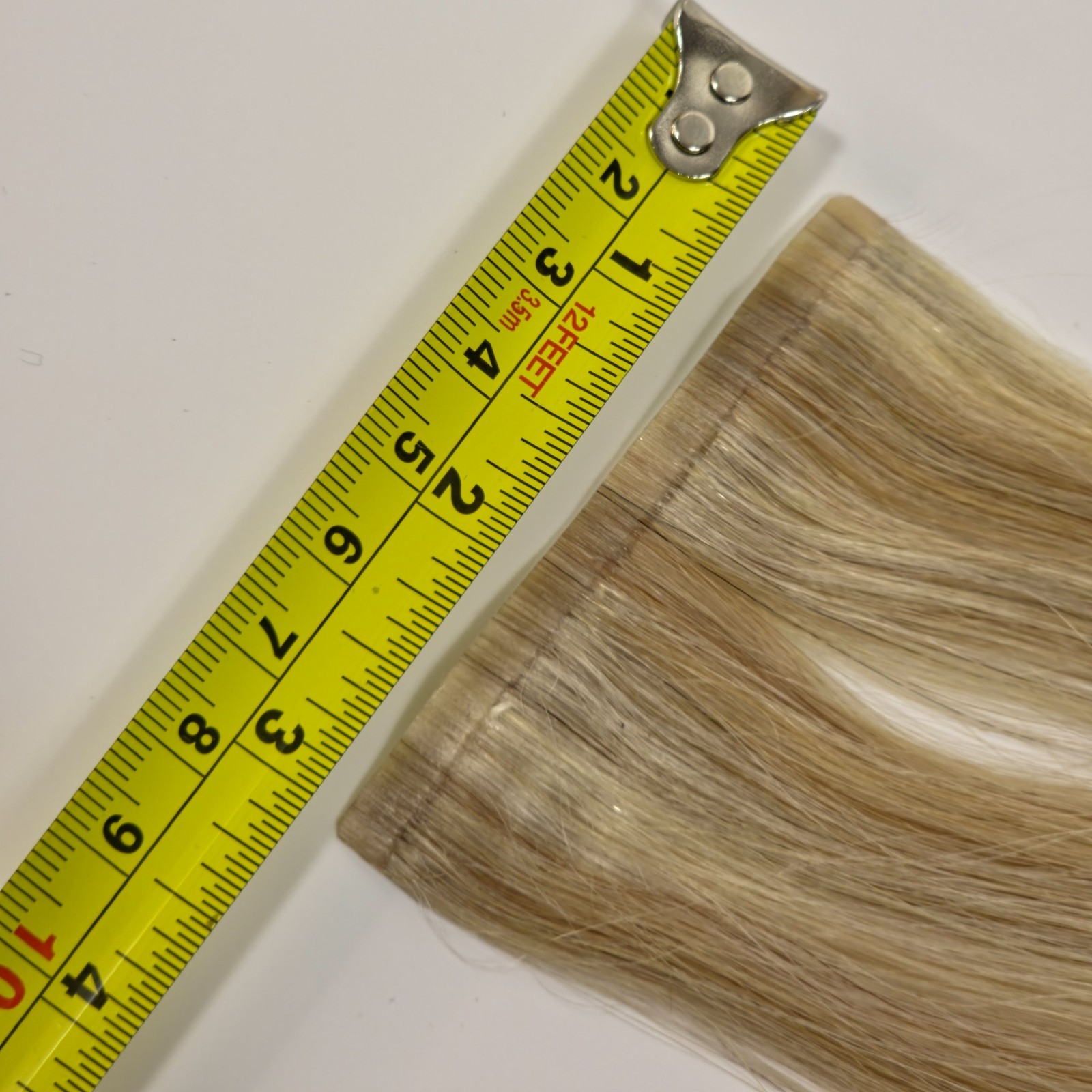 Glam Seamless 16″ Human Hair Clip-In Extension 3″ Wide Single Weft Blonde 23/60