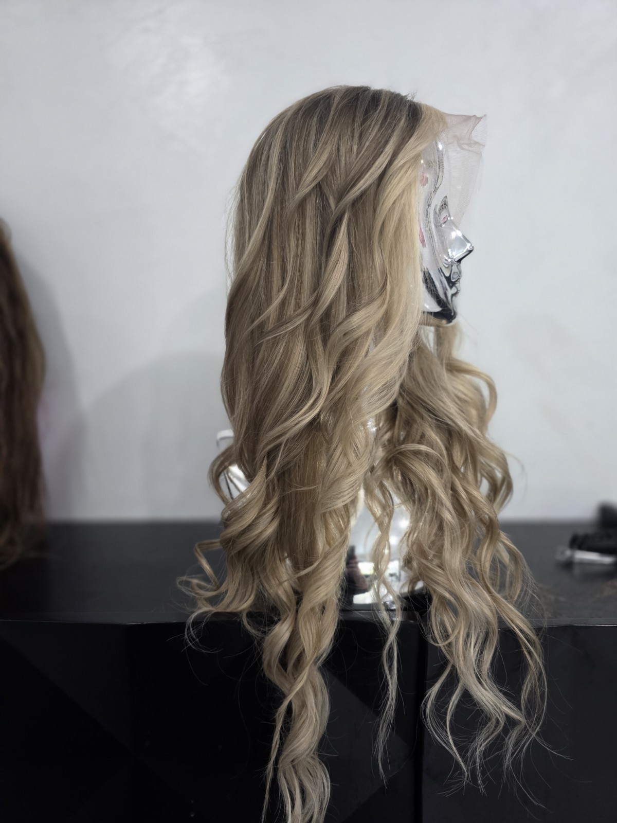 30-inch custom-colored wig crafted from virgin human hair, designed to emulate