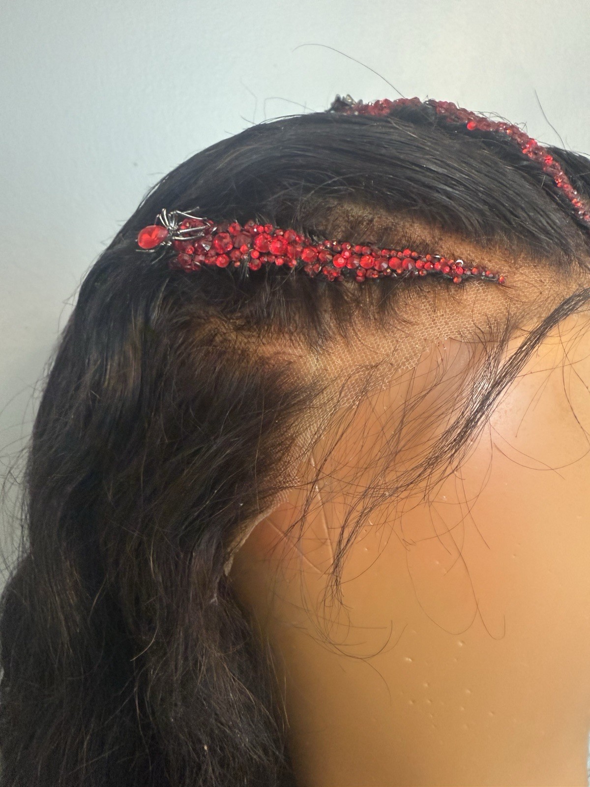 Custom styled human hair wig worn once. 13×6,30 in. w braids, crystals & spiders