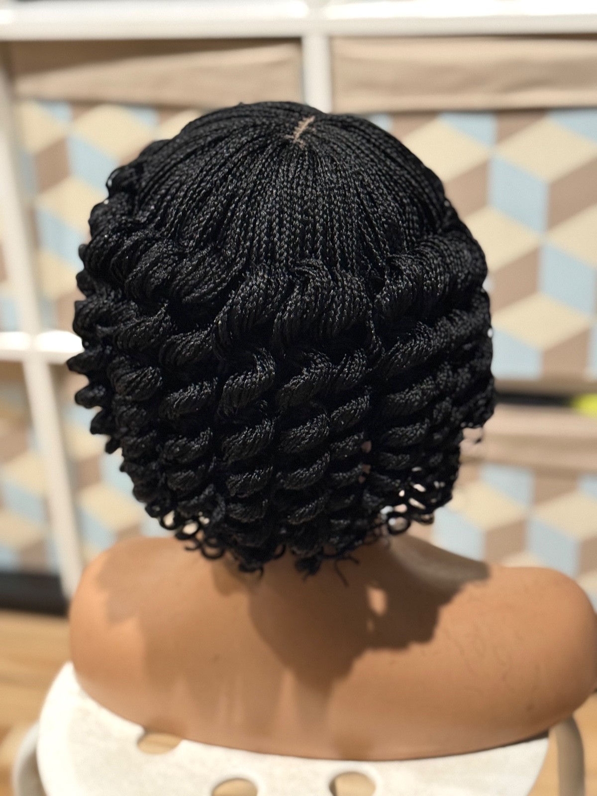 Micro twist braided wig. It is made on a closure