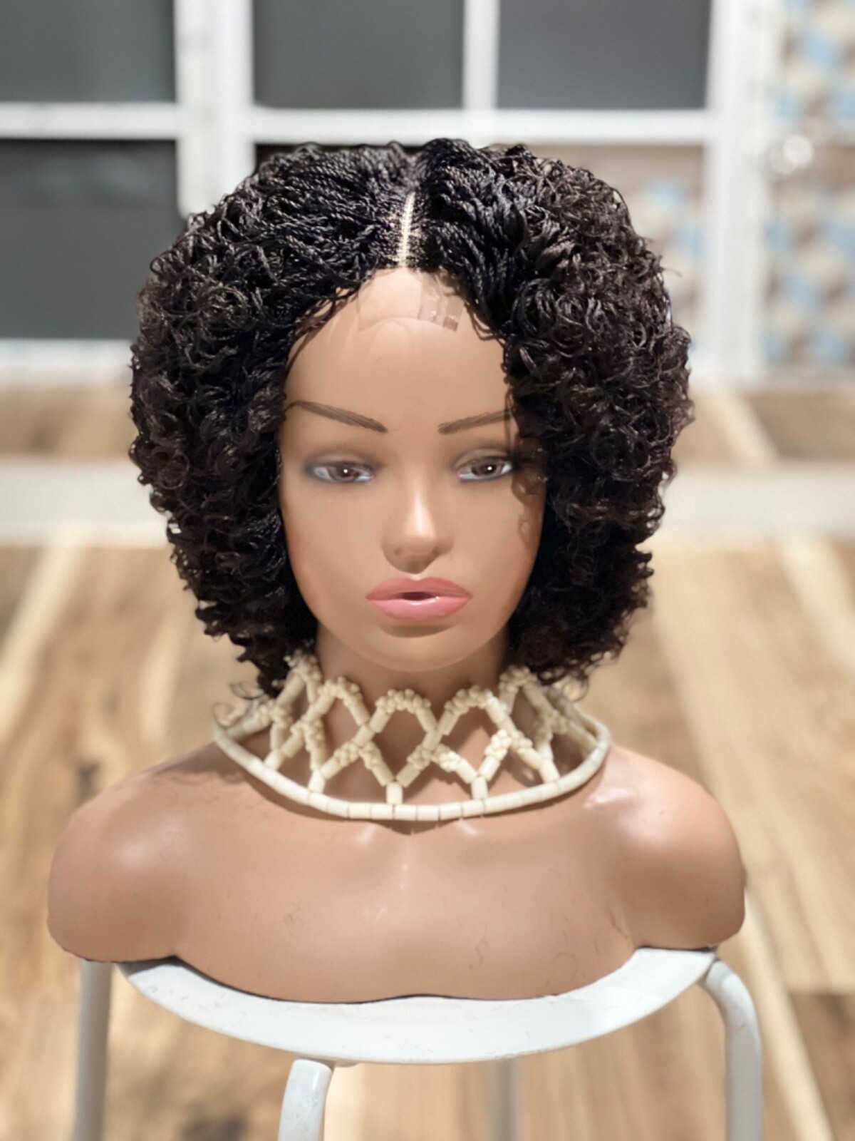 Braided micro twist afro curly wig. just as pictured. color is Brown mix