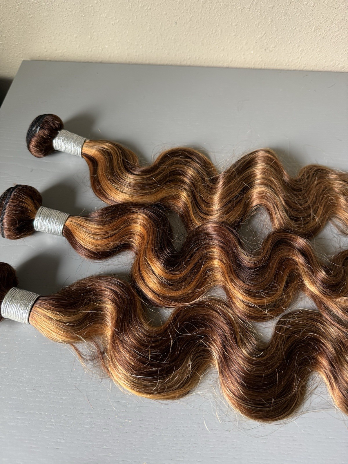 100% Virgin Human Hair Extensions 3 Bundle deal- 20”22”24 Body highlight P4/27
