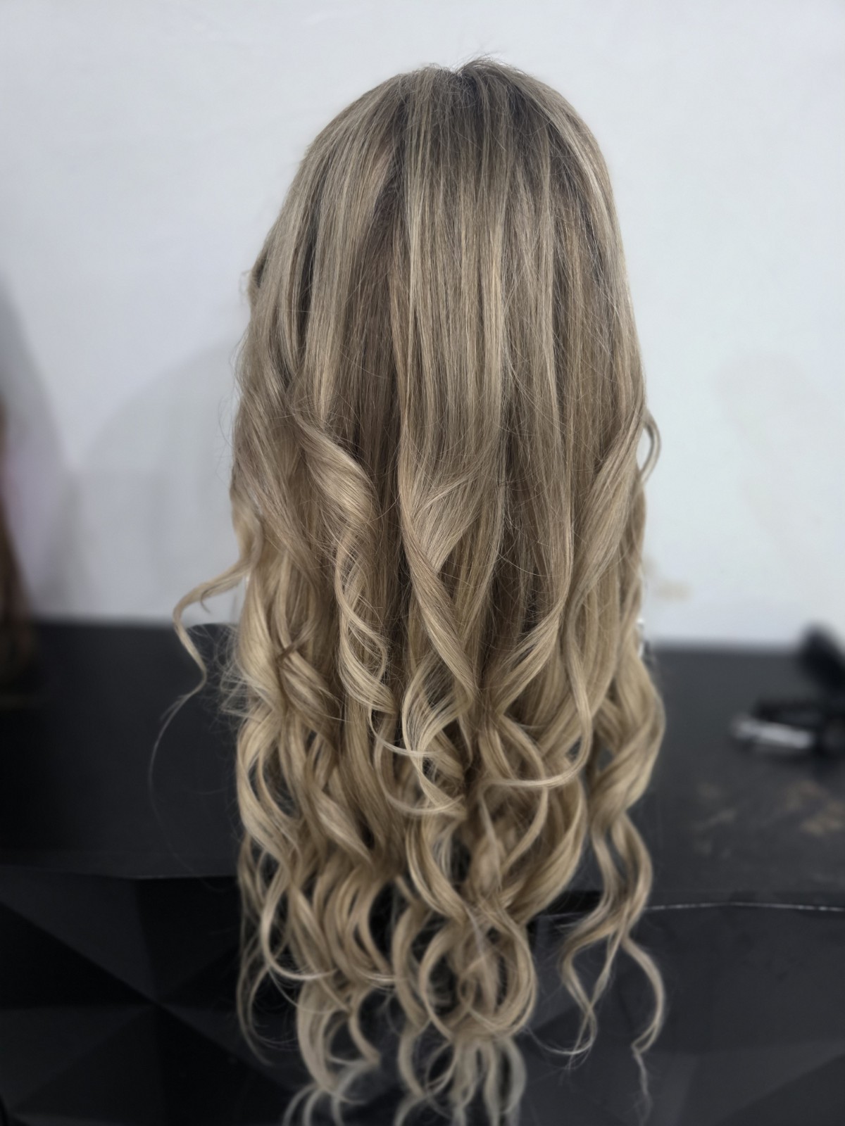 30-inch custom-colored wig crafted from virgin human hair, designed to emulate
