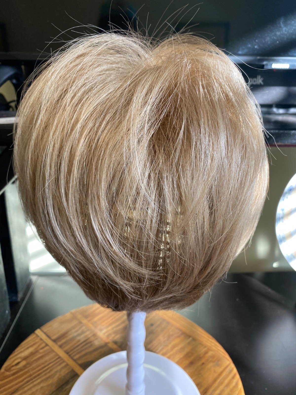 Rene of Paris: Wig – Ash Blond. Comes with stand brush and wig shampoo. (Boxed)