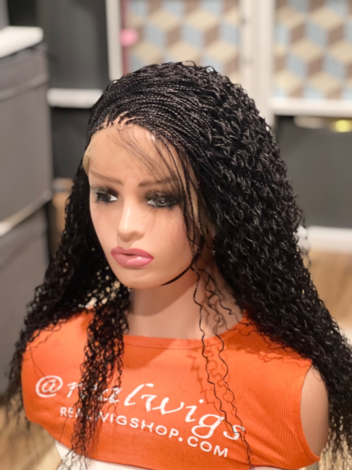 Braided water wave wig made on a full lace wig.length is 18”long..color black.