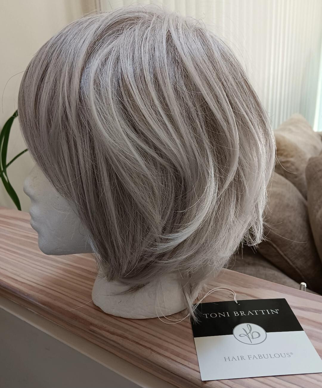 Toni Brattin Flirtatious Wig – Casual Bang with Trendy Cut in Light Gray-Sz PLUS