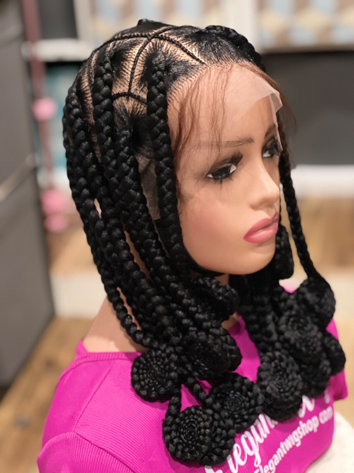 Knotless braided wig, made on a full lace wig. Length Is 16”long.