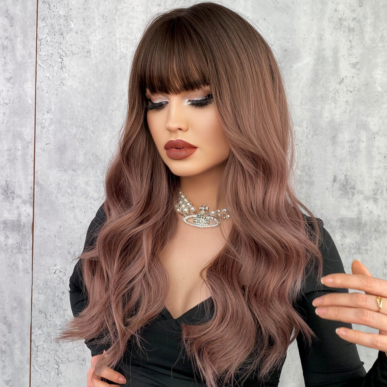 Wavy brownish-blonde wig with frizzy natural big waves and sexy long curly hair
