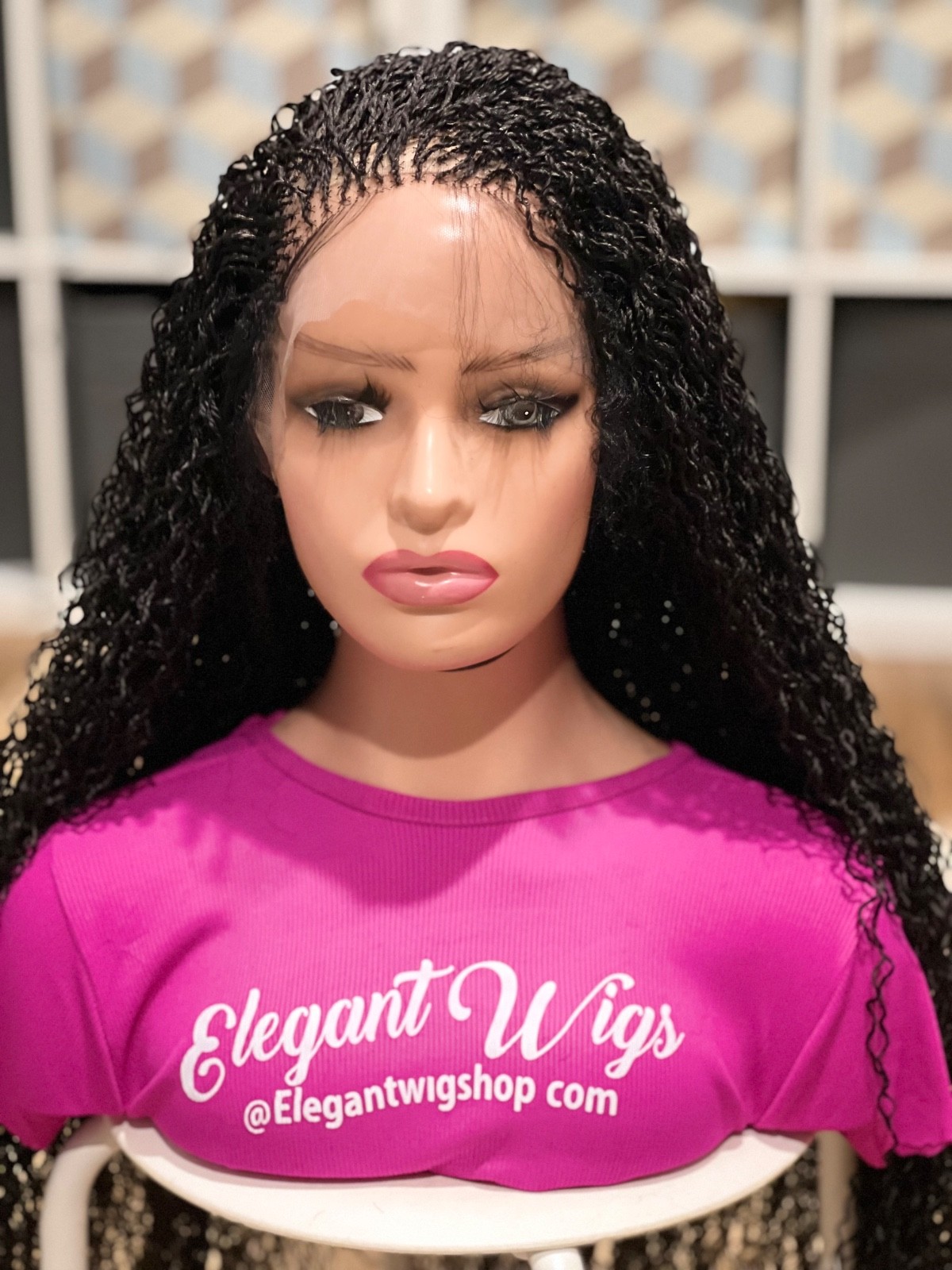 Braided water wave wig made on a full lace wig.length is 30”long. Black.
