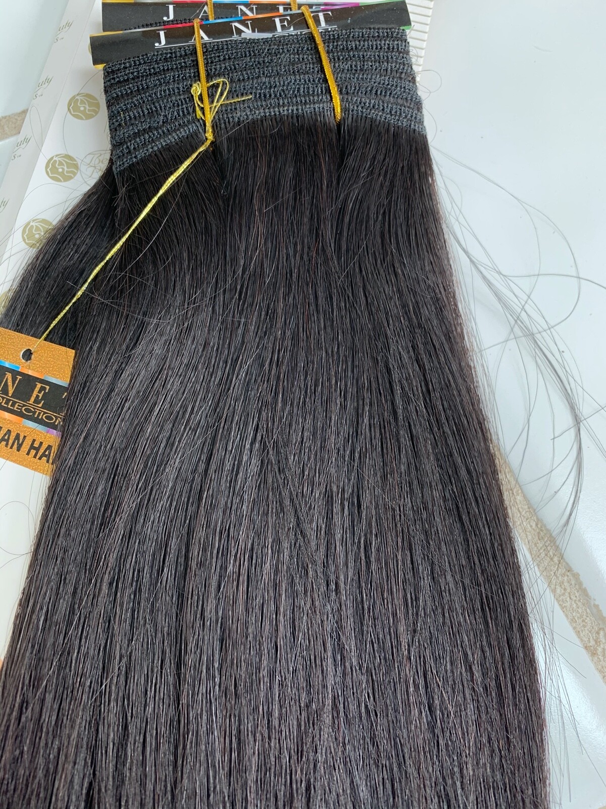 Janet Mink Yaky 100% Human Hair Weave. Color 1, 1B, 2, 4. Length 10″ , 12″