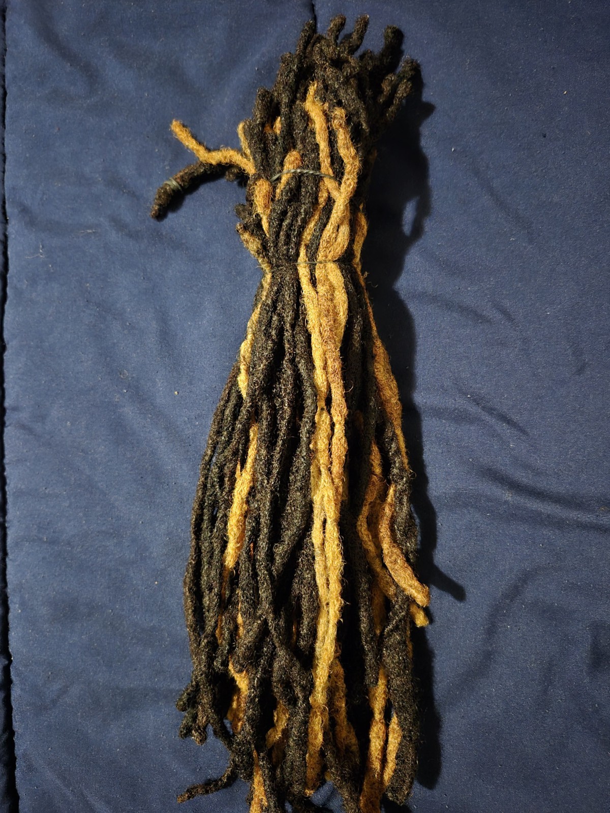64 dreadlocks. 11 inches or longer. Freshly washed and conditioned.