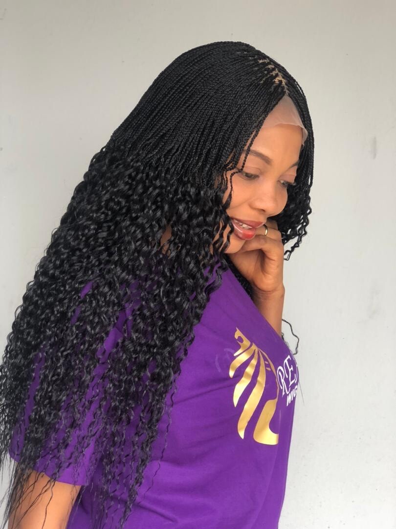 Braided Water Wave Wig. Made on a full lace wig.length is 24inches Long.black.