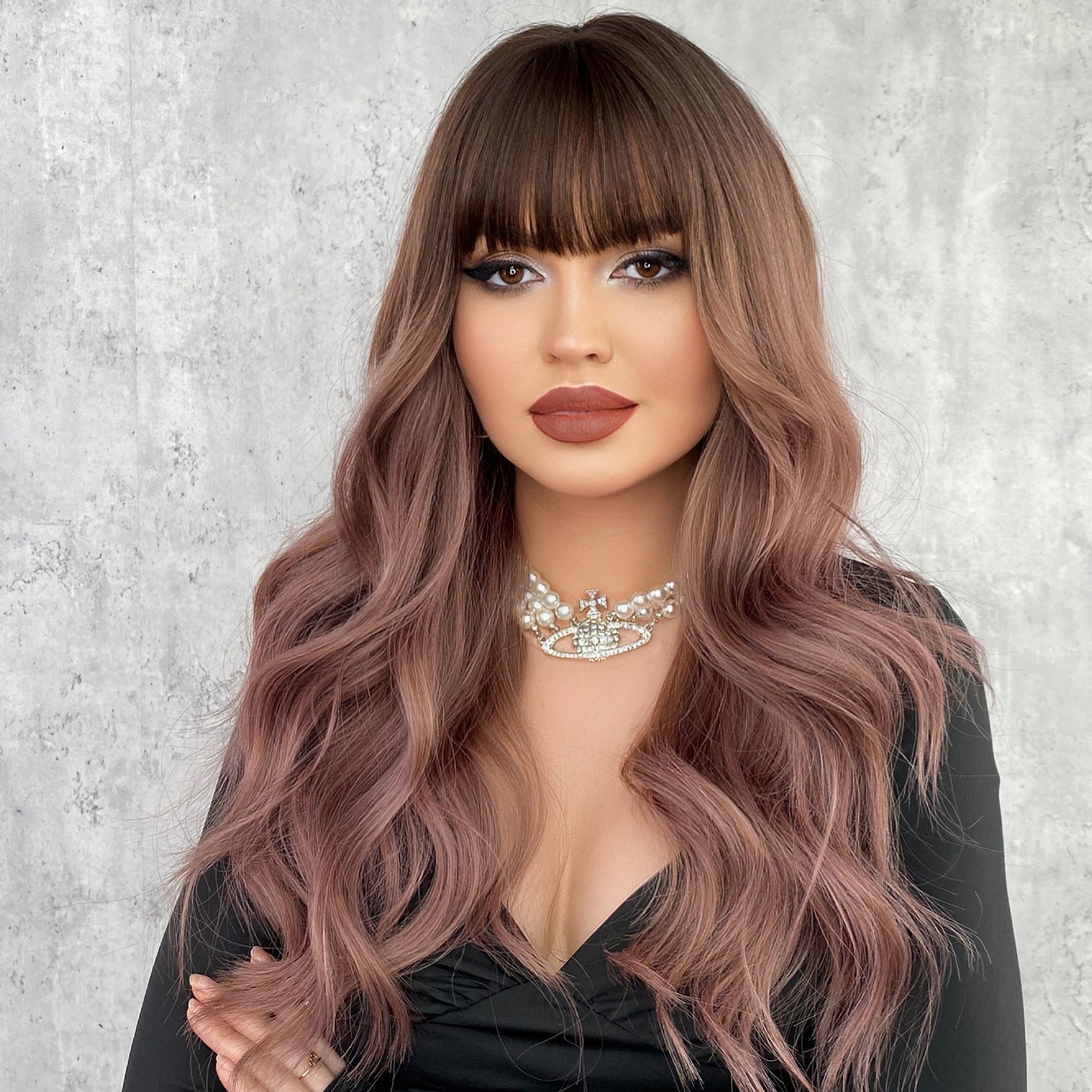Wavy brownish-blonde wig with frizzy natural big waves and sexy long curly hair