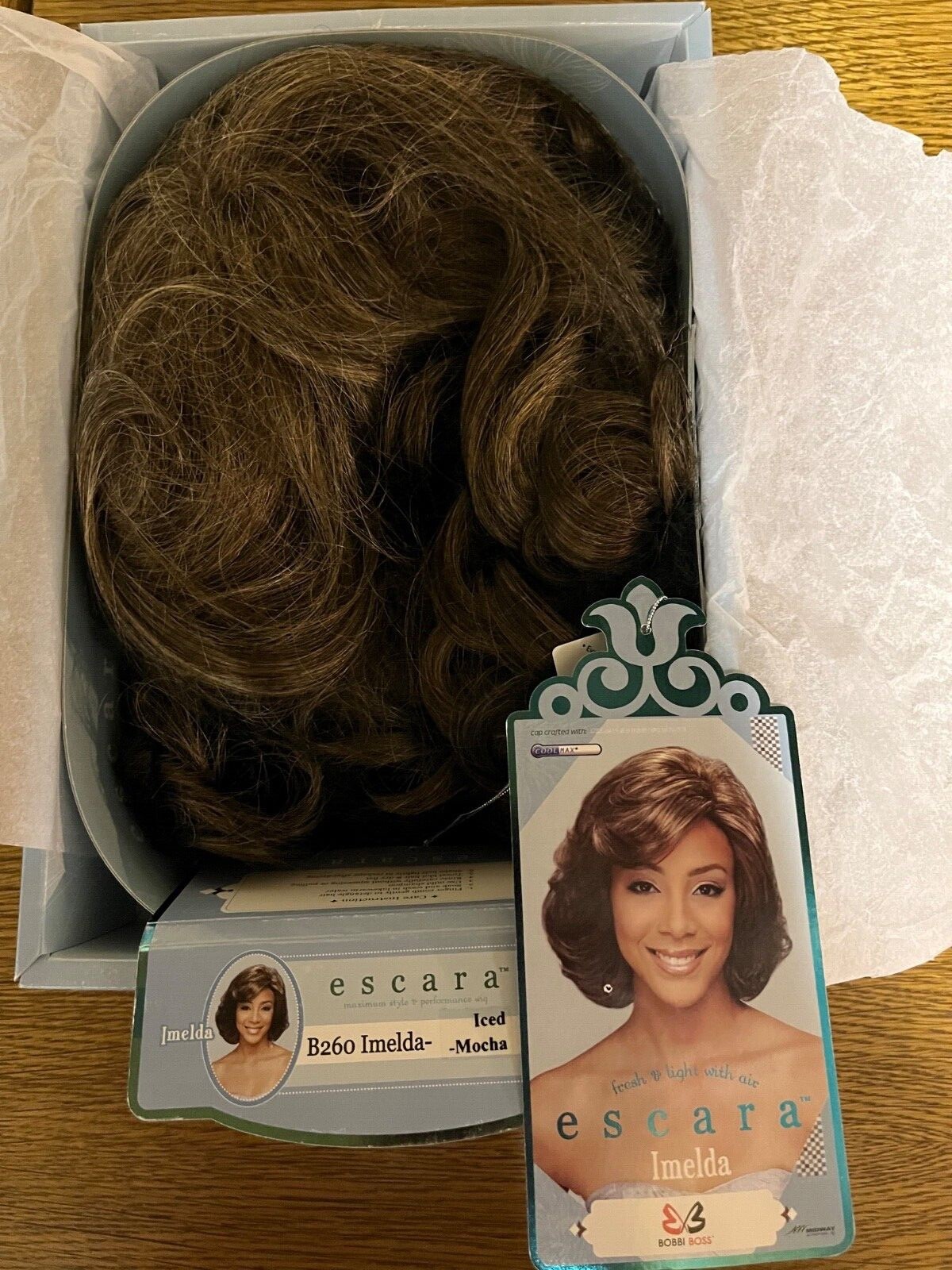 Bobbi Boss Escara synthetic wigs.  Fresh and Light with Air.