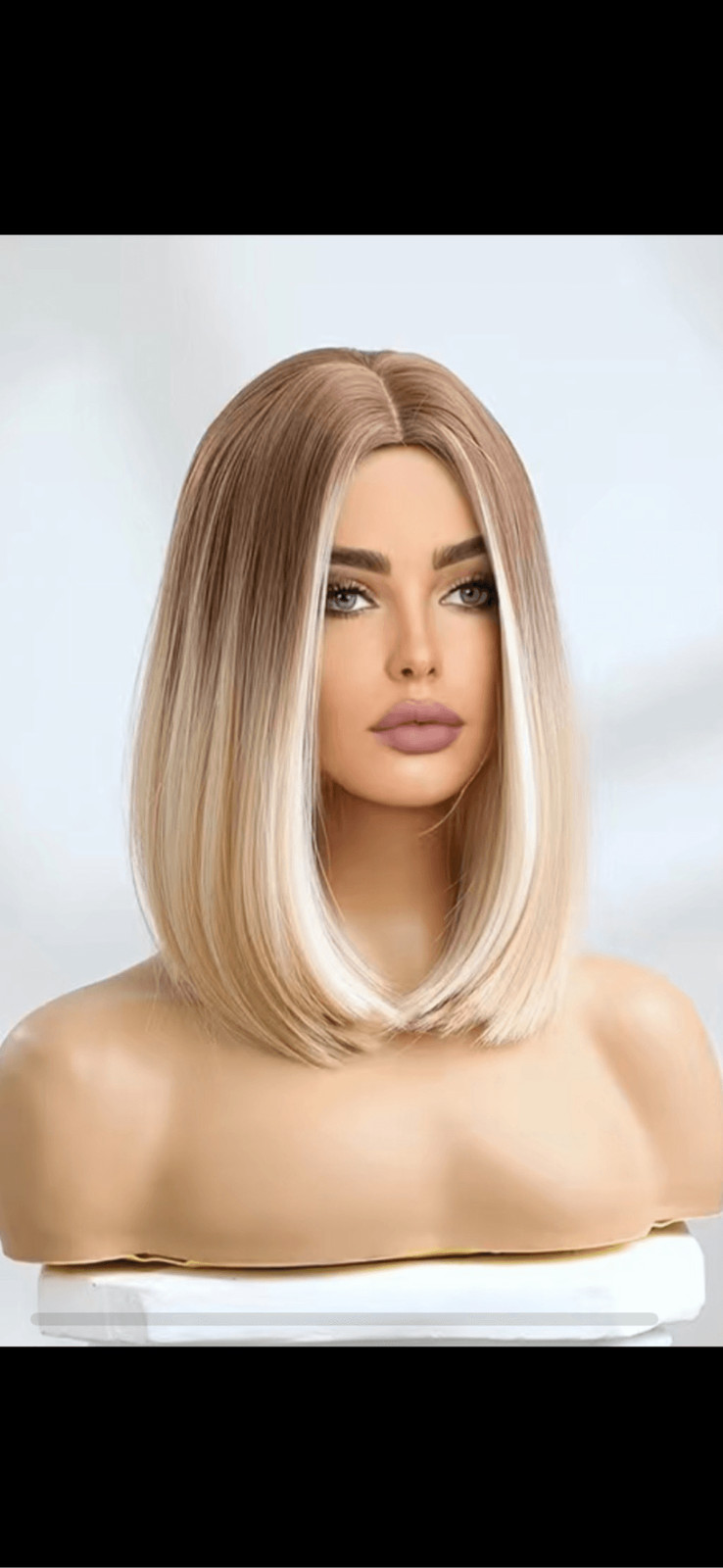 Blonde and beige highlighted 16 inch Shoulder length straight bob with middle pa