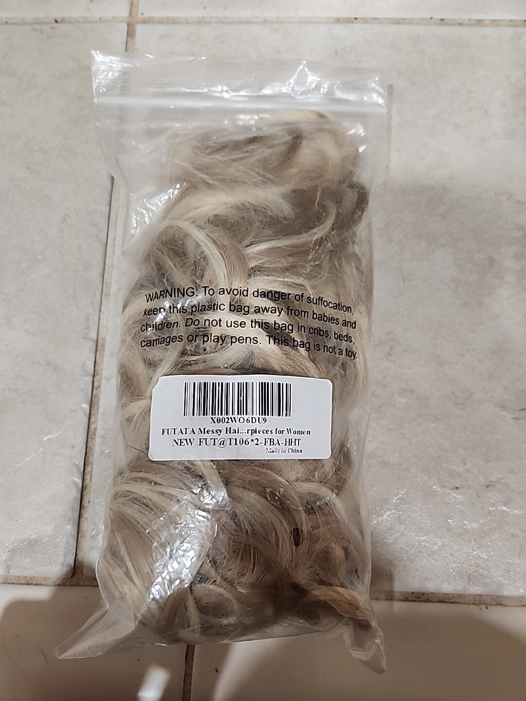 Pair Of Blonde Hair Extentions