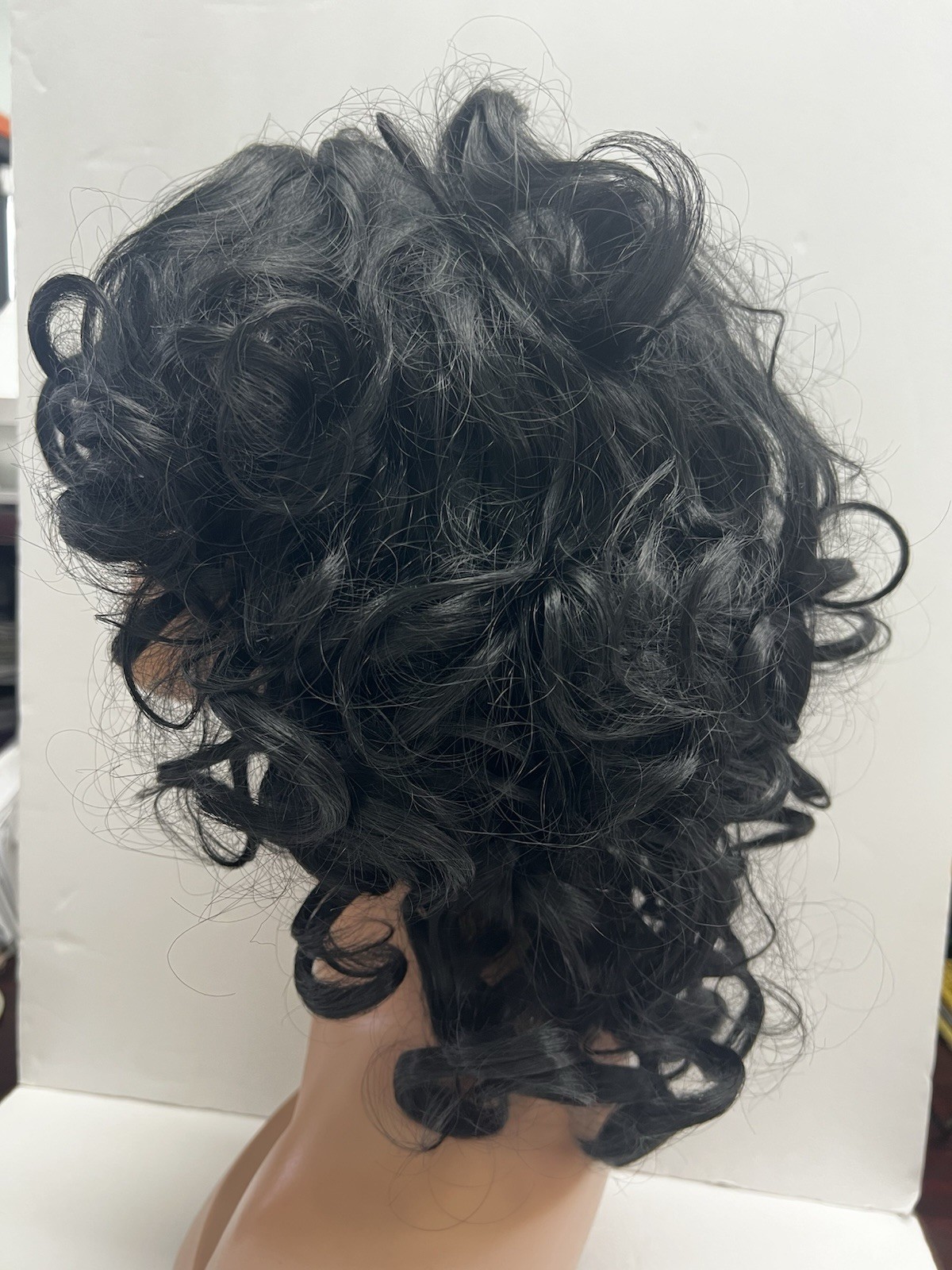 Synthetic Black Curly Hair. New Without Box and Never Been Worn. See Photos.