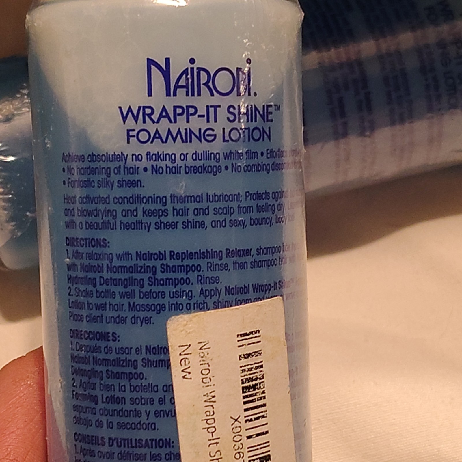Nairobi wrapp-it shine loaming lotion 3 bottles 8oz each
