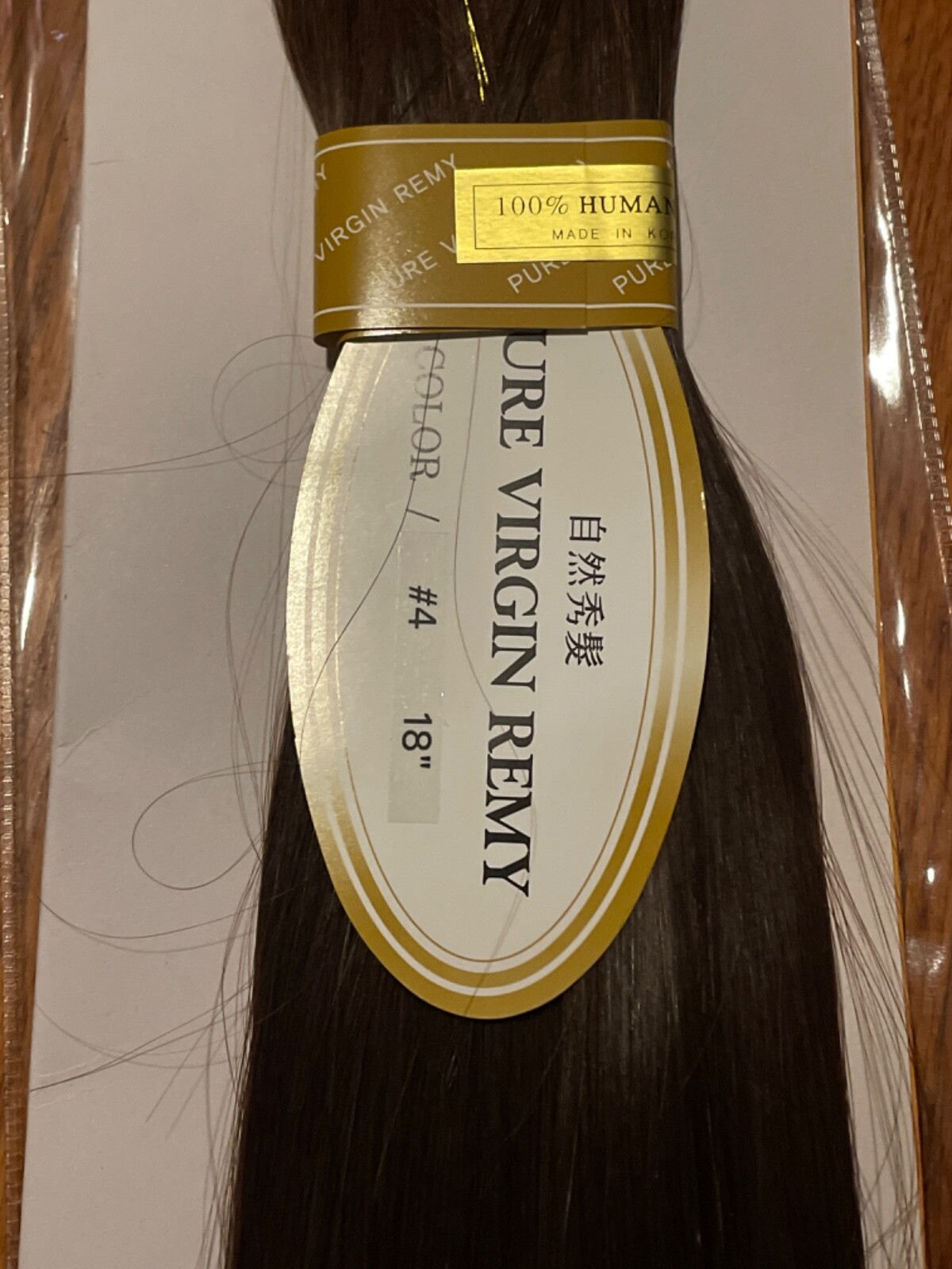 pure virgin remy hair 18″ color #4 on Weft.