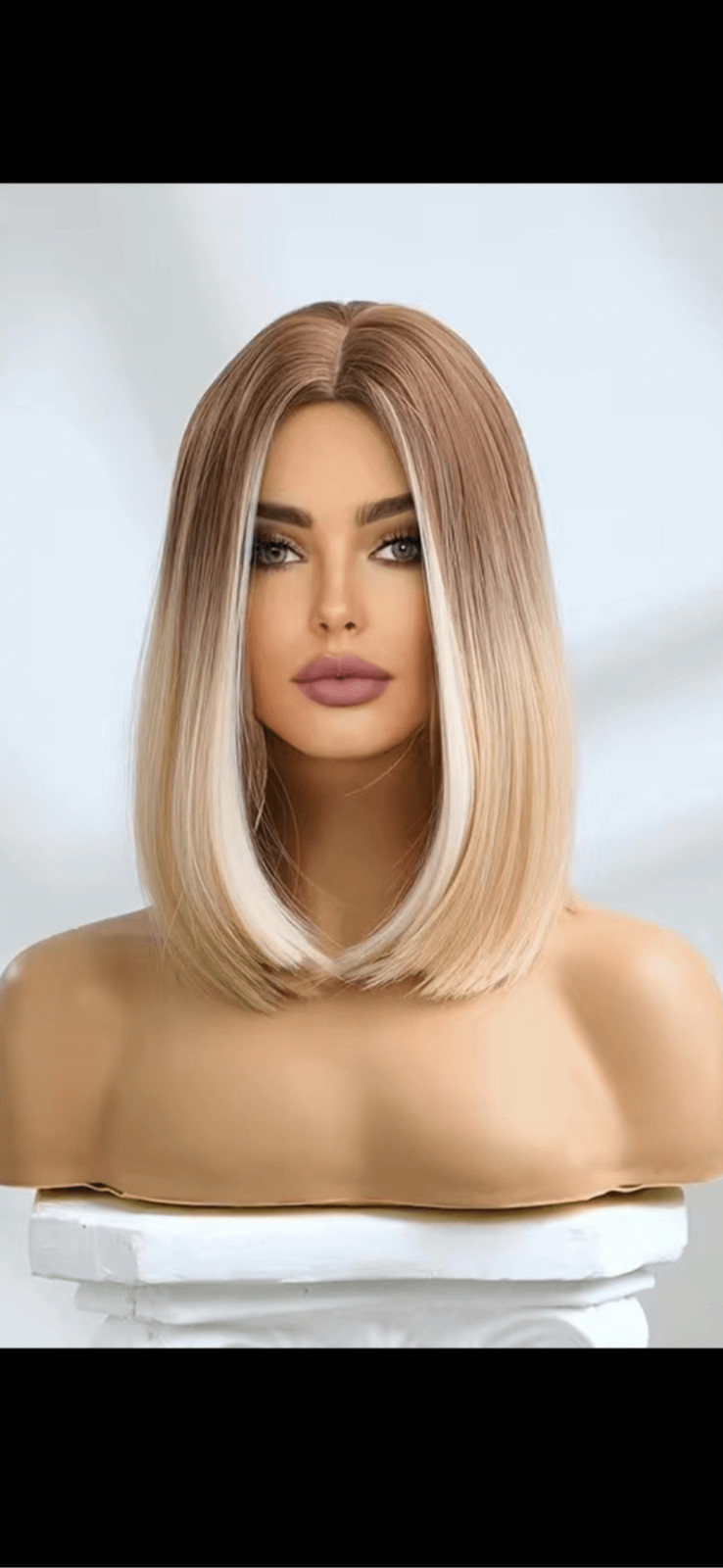 Blonde and beige highlighted 16 inch Shoulder length straight bob with middle pa