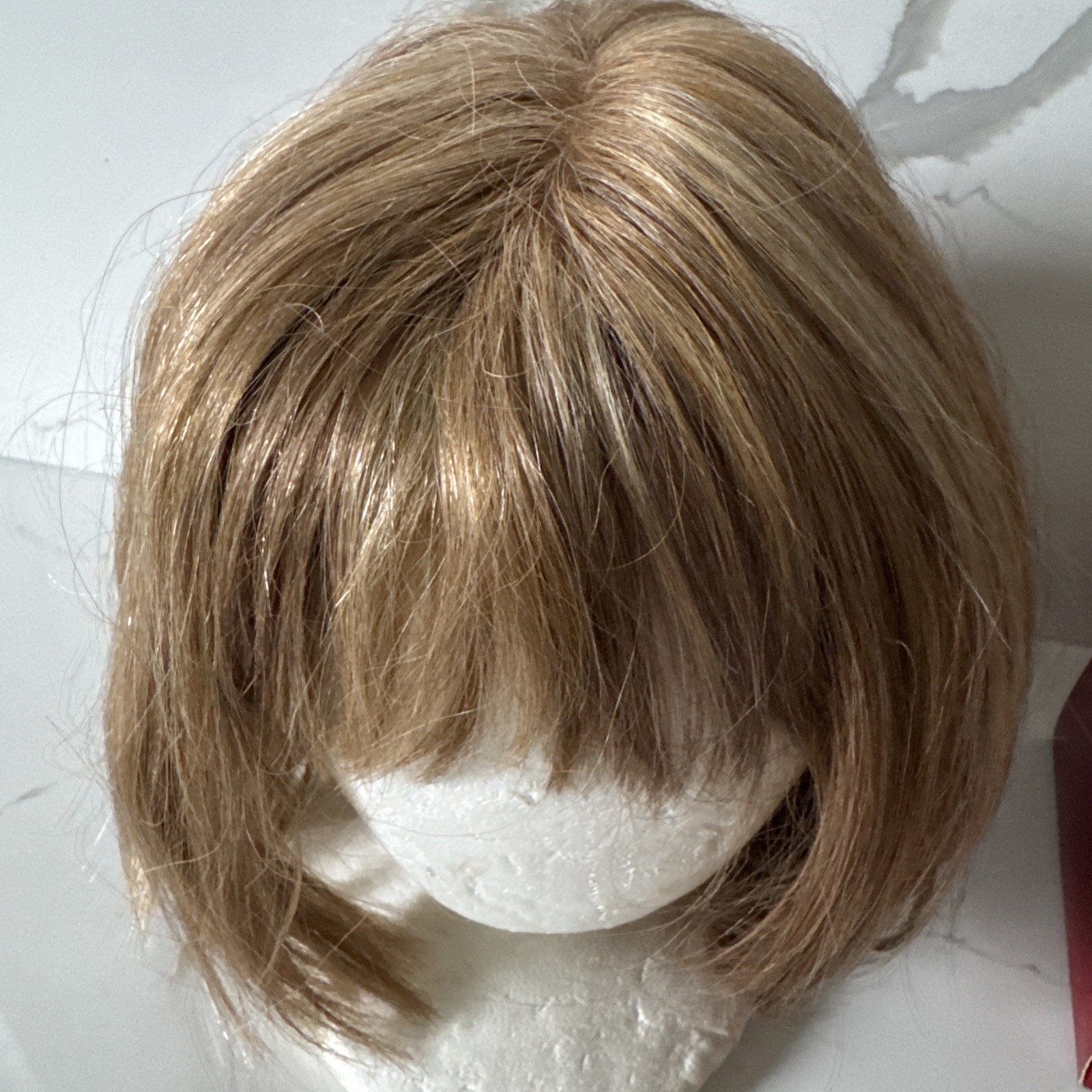 Rene of Paris Synthetic Wig Short Bob with Bangs Blonde Highlighted