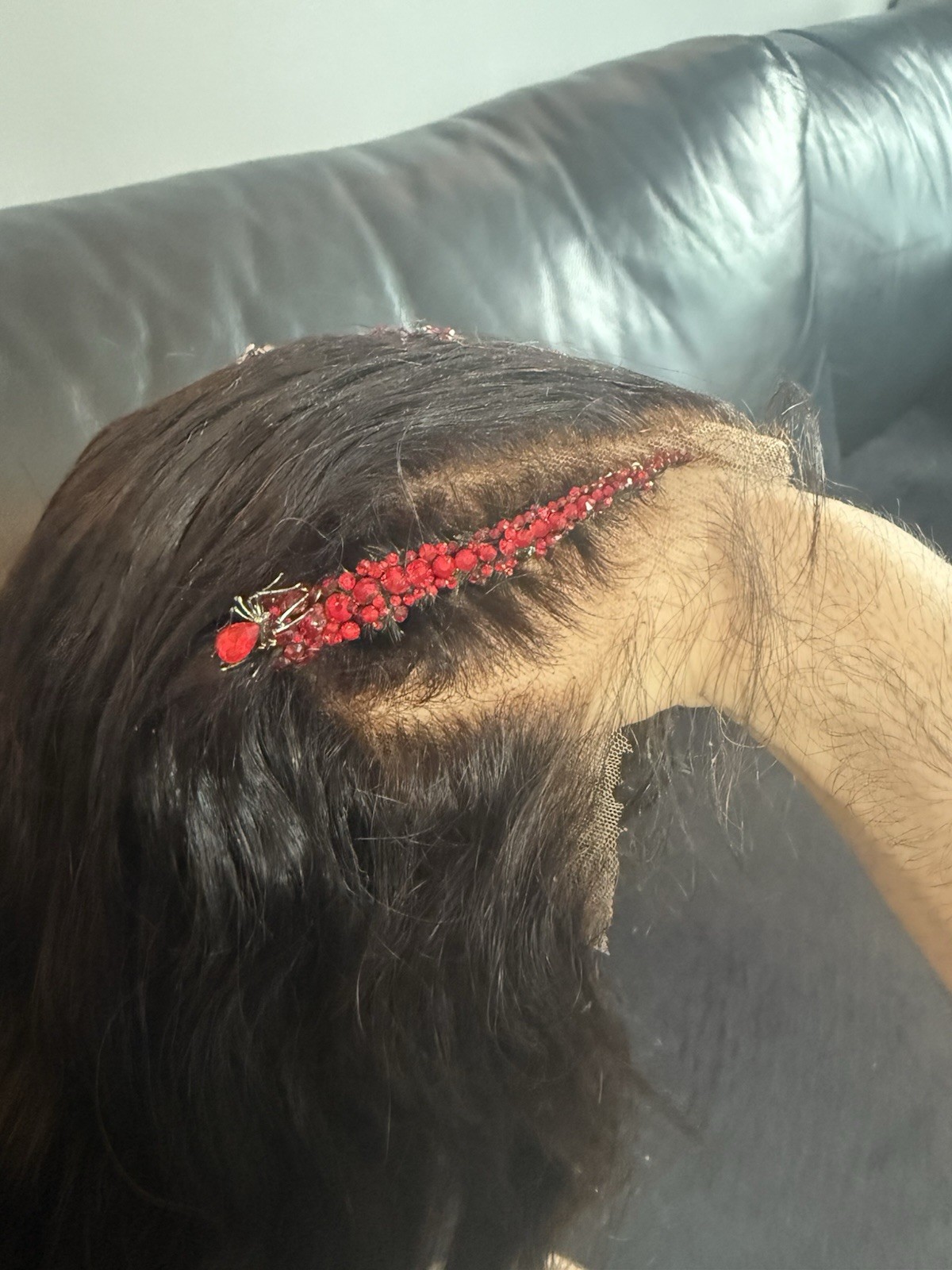 Custom styled human hair wig worn once. 13×6,30 in. w braids, crystals & spiders