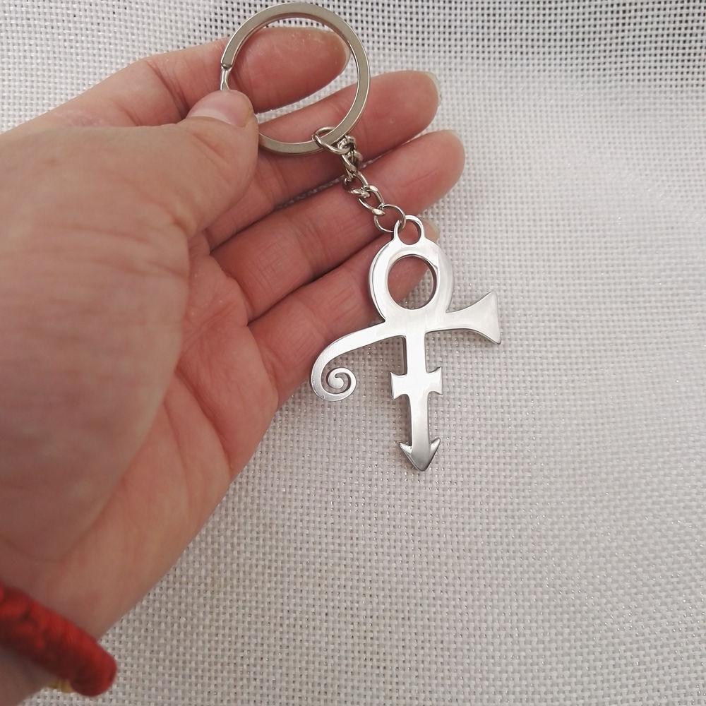 Sanlan 1pcs New Style Fashion Style Glowing Purple Prince Symbol Keychain Purple