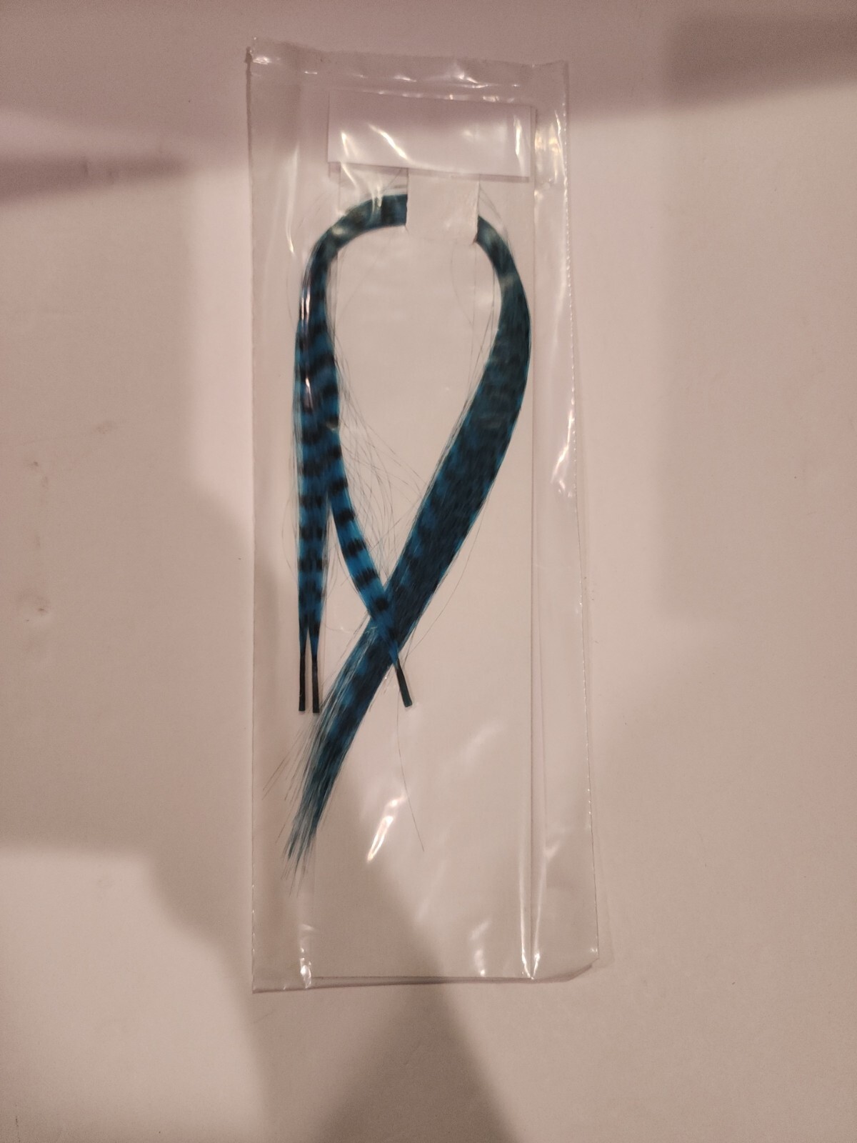 Feather hair extension Blue & black 3 Feathers bonded together at the tip