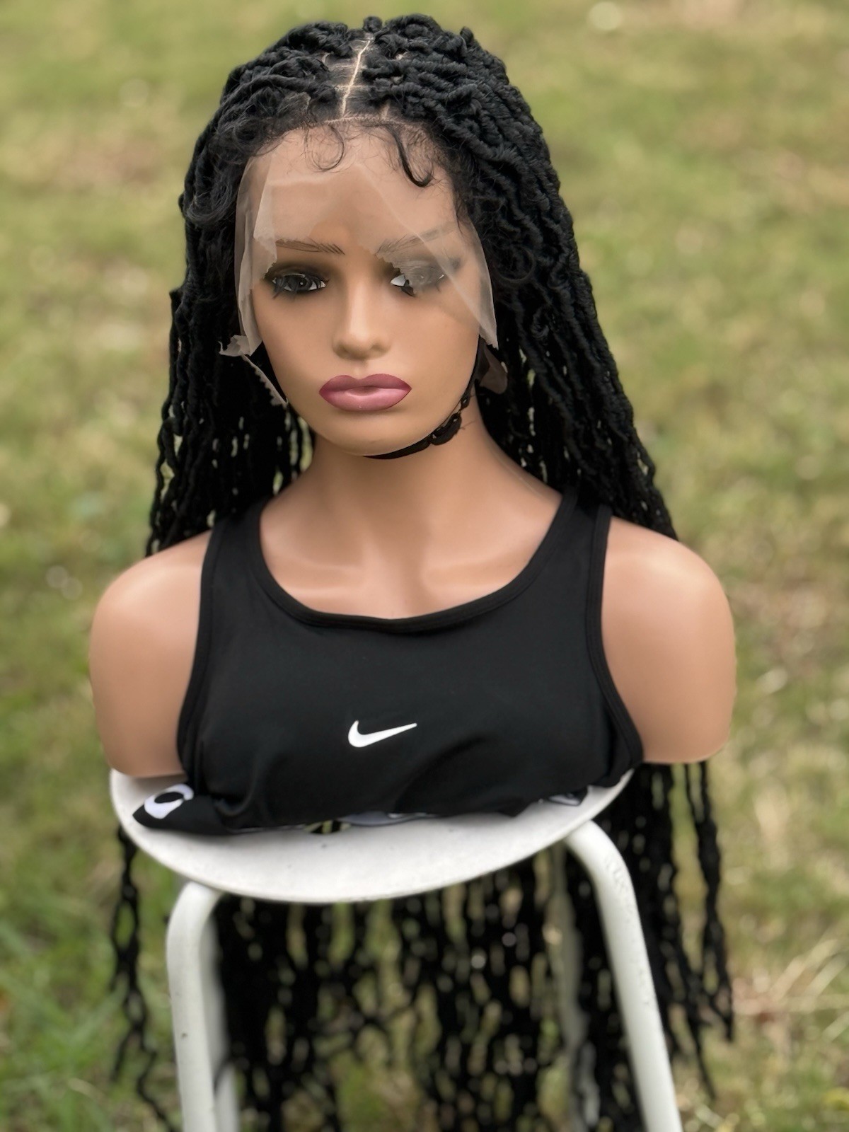 braided handmade faux locs. Color is black. Length Is 26inches. Full Lace Wig