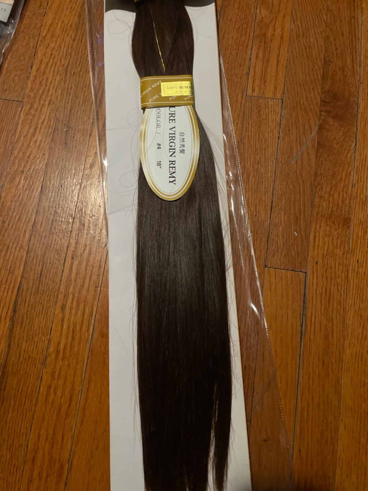 pure virgin remy hair 18″ color #4 on Weft.