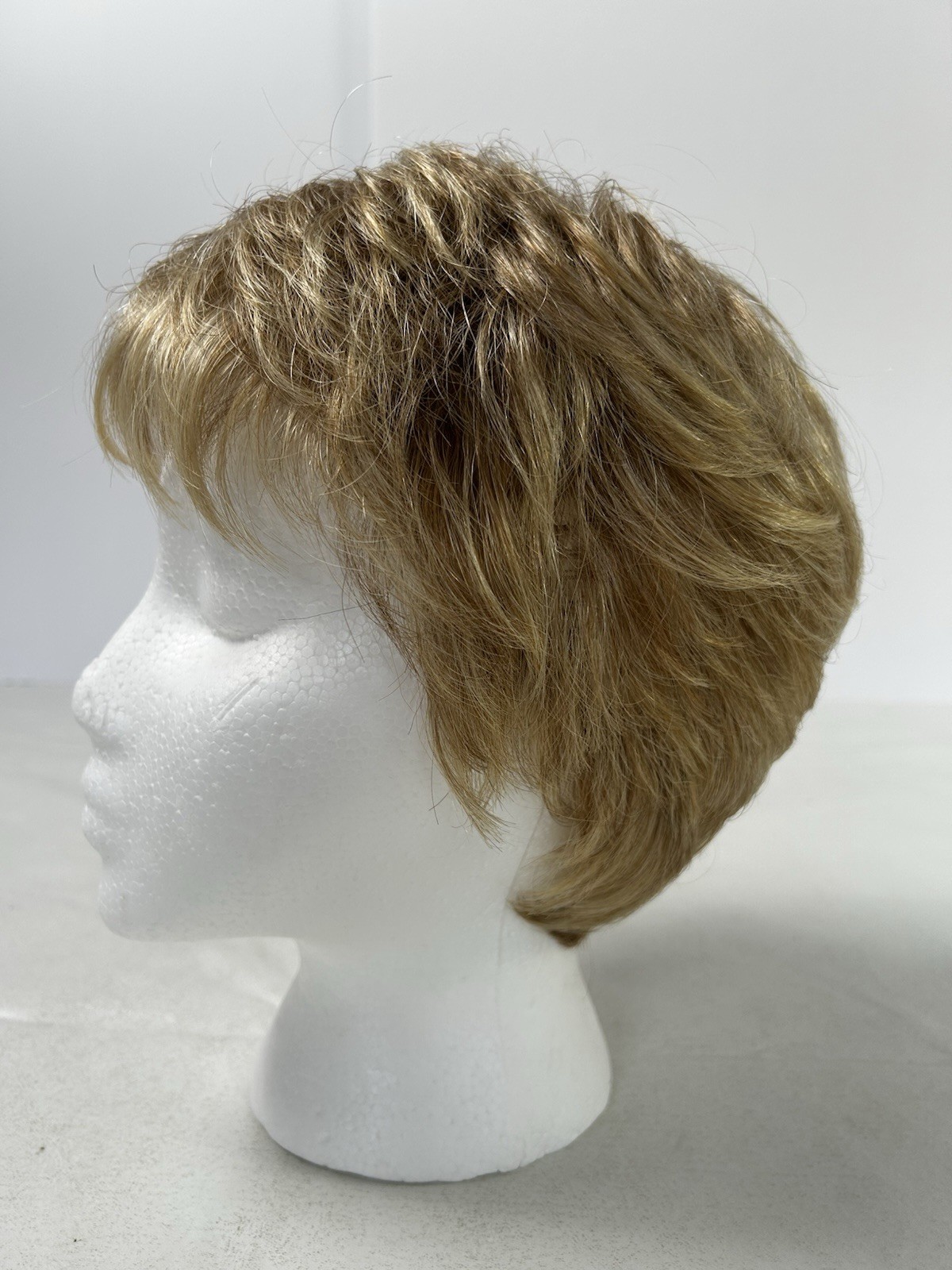 Raquel Welch Signature Collection Synthetic Wig Light Brown Blond Highlights