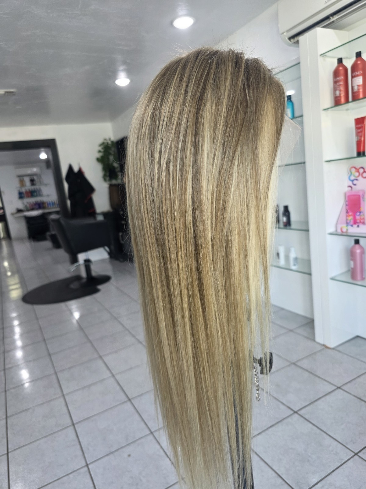 30-inch custom-colored wig crafted from virgin human hair, designed to emulate