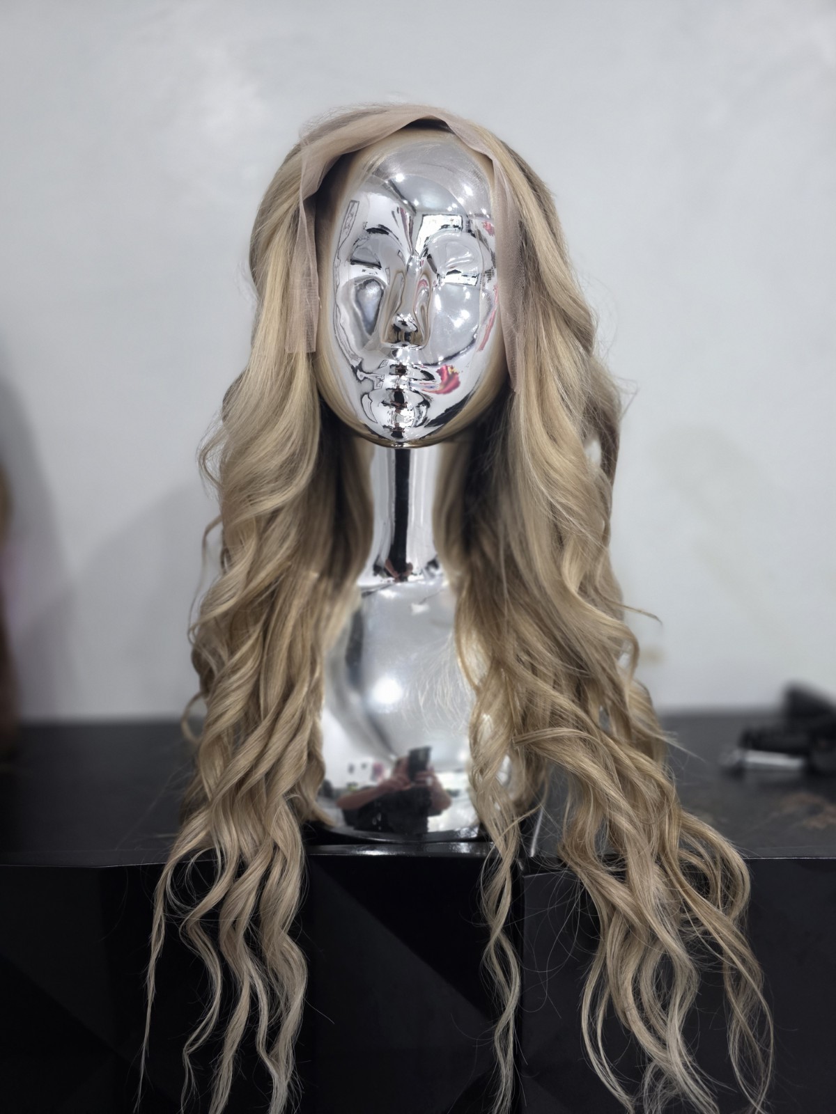 30-inch custom-colored wig crafted from virgin human hair, designed to emulate