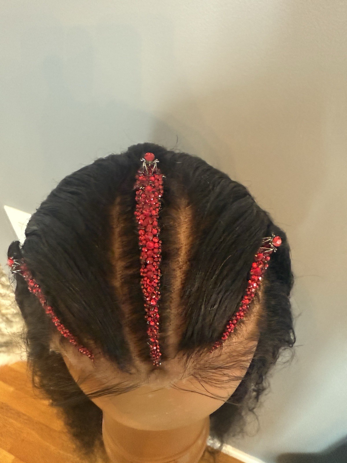 Custom styled human hair wig worn once. 13×6,30 in. w braids, crystals & spiders