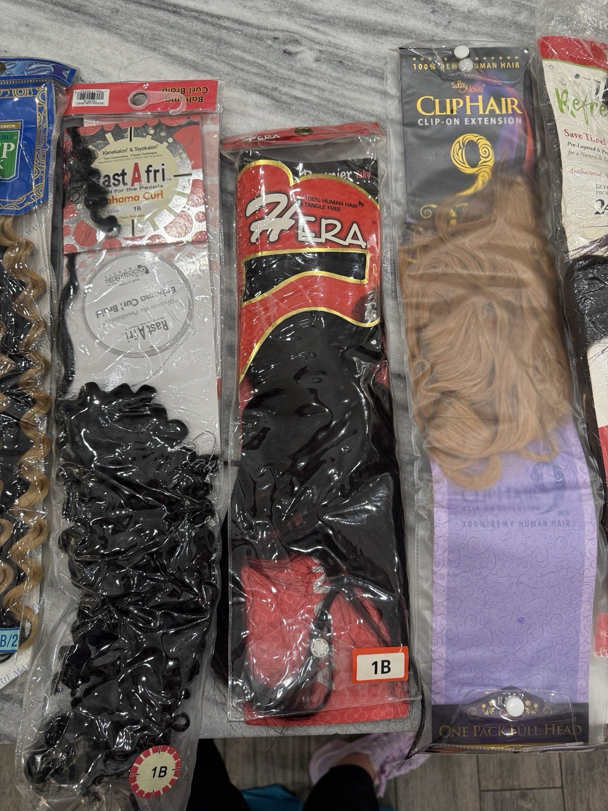 Human And Synthetic Hair Extensions All Lengths And Multiple Colors